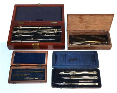 Lot 67 - A set of drawing instruments in a mahogany case by Aston & Mander; and three small cases of drawing