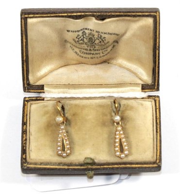 Lot 76 - A pair of seed pearl drop earrings, one stamped '15CT'