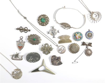 Lot 91 - A collection of silver, white metal and plated brooches, pendants and other jewellery,...