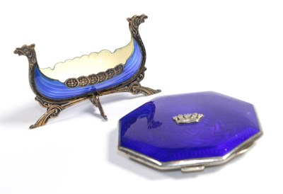 Lot 99 - A silver and enamel lady's powder compact with Naval crown; and a Norwegian enamel Viking boat...