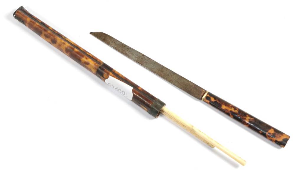 Lot 106 - A Japanese tortoiseshell knife and scabbard with bone chopsticks