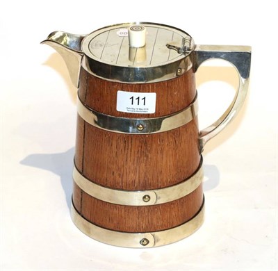 Lot 111 - A Victorian electroplate mounted oak jug, with ceramic liner, makers mark HS&S, the hinged...