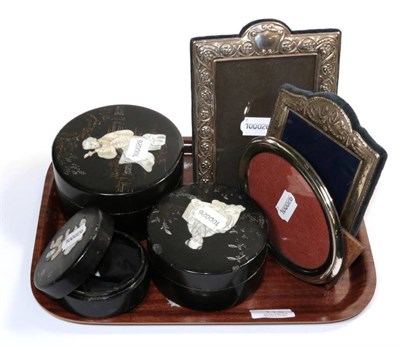 Lot 119 - Three silver photo frames; together with a set of three graduated Chinese lacquered and...