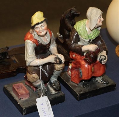 Lot 140A - A pair of pearlware figures of The Cobbler and his Wife