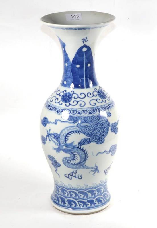 Lot 143 - A large Chinese blue and white porcelain vase, decorated with dragons chasing a flaming pearl...