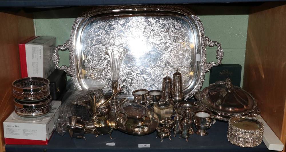 Lot 157 - A silver plate twin handled tray, a pair of coasters, two oval dishes, two cased condiment sets and