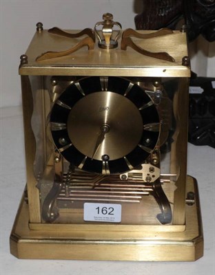 Lot 162 - A brass cased chiming mantel clock signed Schatz, striking on eight gong rods