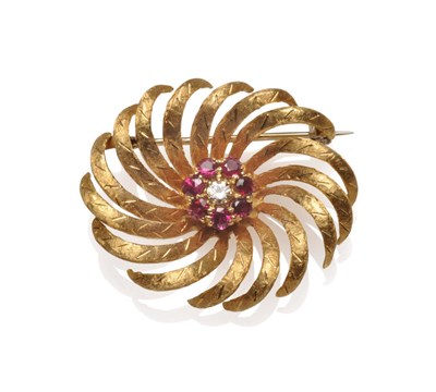 Lot 588 - An 18 Carat Gold Diamond and Ruby Brooch, a cluster comprised of a round brilliant cut diamond...