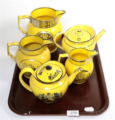 Lot 219 - A group of 19th Century canary yellow ground silver lustre and transfer printed ceramics, one...