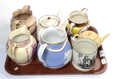 Lot 227 - A group of 19th Century English jugs and teapots, including a pink printed example; a relief...