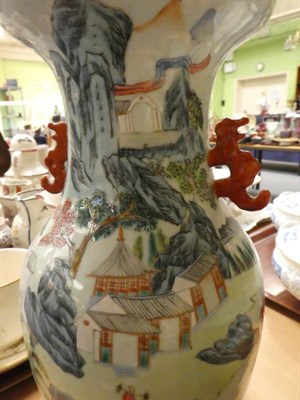 Lot 241 - An early 20th century Chinese porcelain twin handled vase decorated with landscapes