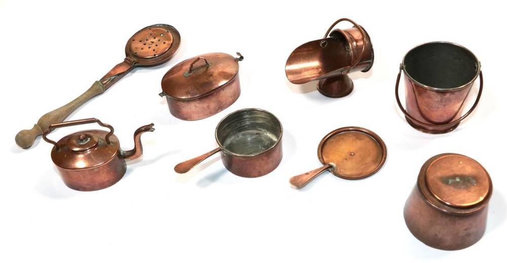 Lot 255 - Miniature copper ware including coal scuttle, bucket, warming pan, kettle, three saucepans with...