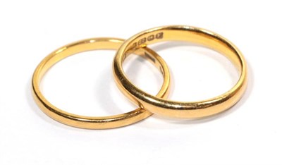 Lot 278 - Two 22 carat gold band rings, finger size O1/2 and R