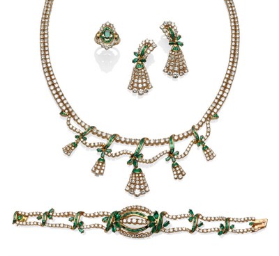 Lot 596 - An Emerald and Diamond Suite, the necklace set throughout with graduated round brilliant cut...