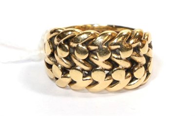 Lot 290 - A 18 carat gold knot ring, finger size J