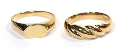 Lot 301 - A 9 carat gold signet ring, finger size O; and another 9 carat gold ring, finger size O (2)