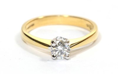 Lot 304 - An 18 carat gold solitaire diamond ring, a round brilliant cut diamond in a white claw setting,...