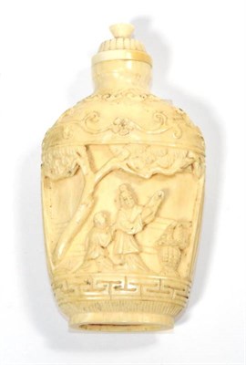 Lot 308 - A Japanese carved ivory snuff bottle