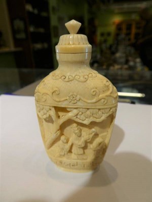 Lot 308 - A Japanese carved ivory snuff bottle