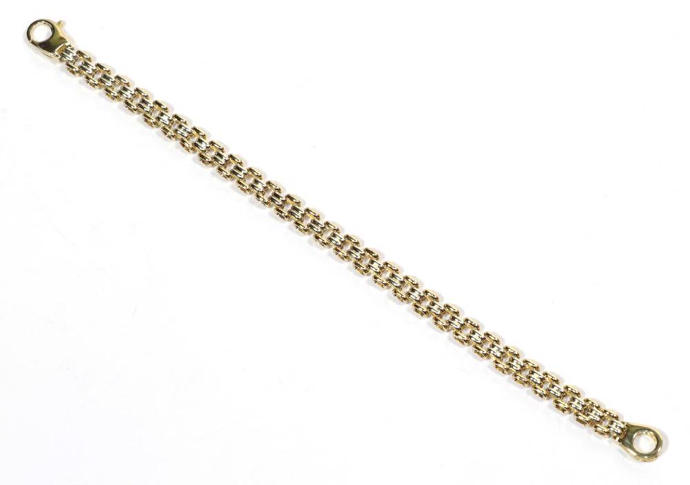 Lot 311 - A 9 carat two colour gold bracelet, length 19cm