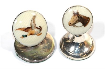 Lot 314 - Two silver and enamel menu holders depicting a horses head and a duck in flight