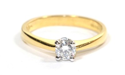 Lot 316 - An 18 carat gold solitaire diamond ring, a round brilliant cut diamond in a white claw setting,...