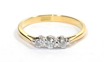 Lot 317 - A diamond three stone ring, the round brilliant cut diamonds in white claw settings, total...