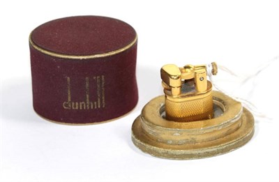 Lot 321 - A Dunhill yellow metal baby cigarette lighter, circa 1950, boxed