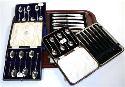 Lot 335 - Three cased sets of six coffee spoons and two cased sets of six knives