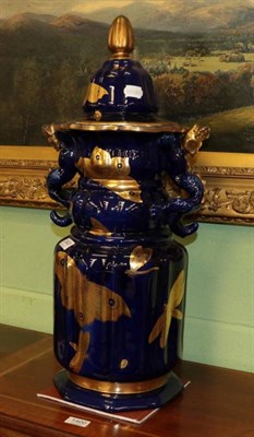 Lot 343 - A large Masons ironstone blue ground twin-handled jar and cover, decorated in gilt with butterflies