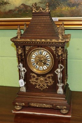 Lot 350 - A gilt metal mounted striking mantle clock of architectural form, with knights in armour pilasters