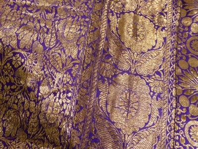 Lot 1005 - Circa 1920's purple silk chiffon drop waist dress, decorated with metallic silver beads and...