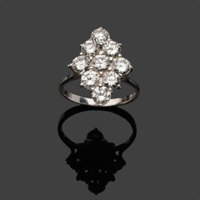 Lot 605 - An 18 Carat White Gold Diamond Cluster Ring, nine round brilliant cut diamonds arranged in a...