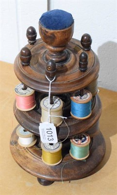 Lot 1013 - Three tier bobbin stand with acorn finials and cotton reels