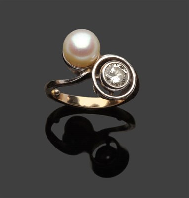 Lot 608 - A Cultured Pearl and Diamond Twist Ring, the round brilliant cut diamond in a white rubbed over...