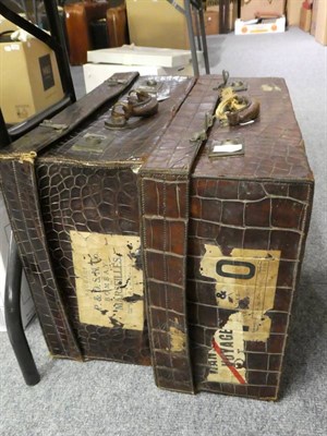 Lot 1046 - The North West Tannery Co Ltd, Cawnpore crocodile leather suitcase, bearing a label to the...