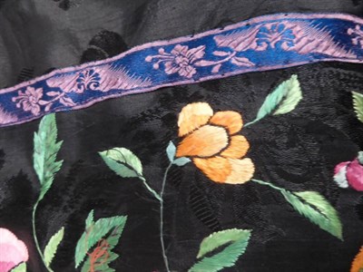Lot 1051 - Assorted Chinese textiles including a magenta silk apron embroidered with figures, childs...