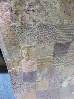 Lot 1062 - Early 19th century patchwork quilt comprising approximately 10cm squares in early printed...