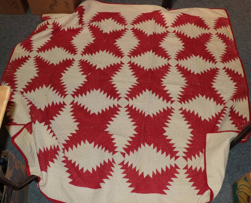 Lot 1063 - Circa 1920s Canadian patchwork quilt, worked in turkey red and white cotton in the pineapple...
