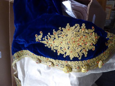 Lot 1075 - European blue velvet jacket with gold embroidery and coral type beads, similar style hat with...
