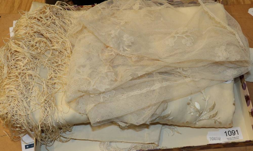 Lot 1091 - Two lace embroidered baby bonnets, cream silk embroidered scarf, baby cream wool blanket with cream
