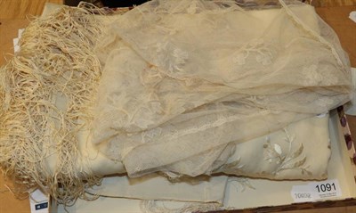 Lot 1091 - Two lace embroidered baby bonnets, cream silk embroidered scarf, baby cream wool blanket with cream