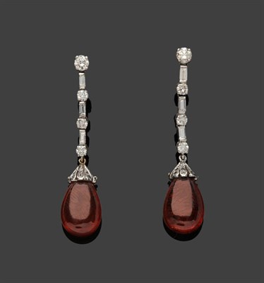 Lot 616 - A Pair of 18 Carat White Gold Garnet and Diamond Drop Earrings, round brilliant cut diamonds...