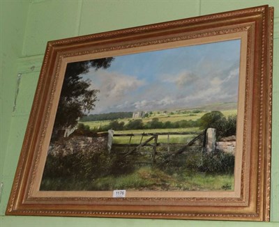 Lot 1176 - Clive Madgwick (1934-2005) A castle in a sun bathed landscape (possibly Castle Bolton), signed...
