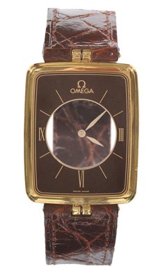 Lot 627 - A Rare 18ct Gold Mystery Wristwatch, signed Omega, Model: La Magique, circa 1981, quartz...