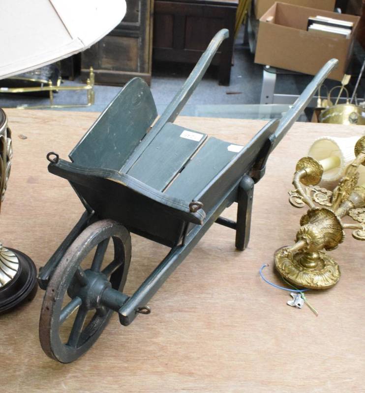 Lot 1245 A small wheelbarrow
