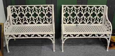 Lot 1273 - A pair of white painted metal garden benches