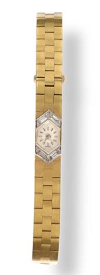 Lot 631 - A Lady's 18ct Gold Diamond Set Back Winding Wristwatch, signed Cartier, circa 1950, 17-jewel...