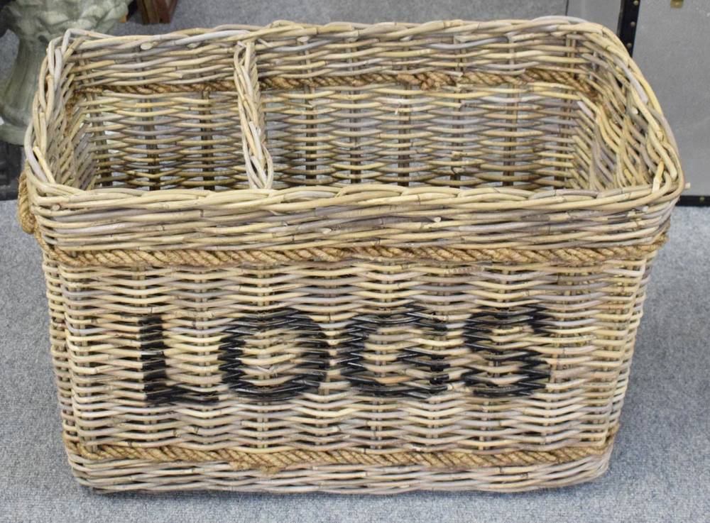 Lot 1284 - A large wicker two division log basket