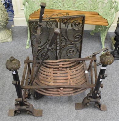 Lot 1285 - A fire grate and tools together with a fire guard